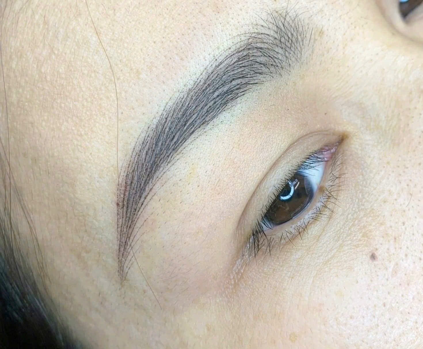 Close-up of completed permanent makeup eyebrow work at DIVA Skin Clinic Poipet